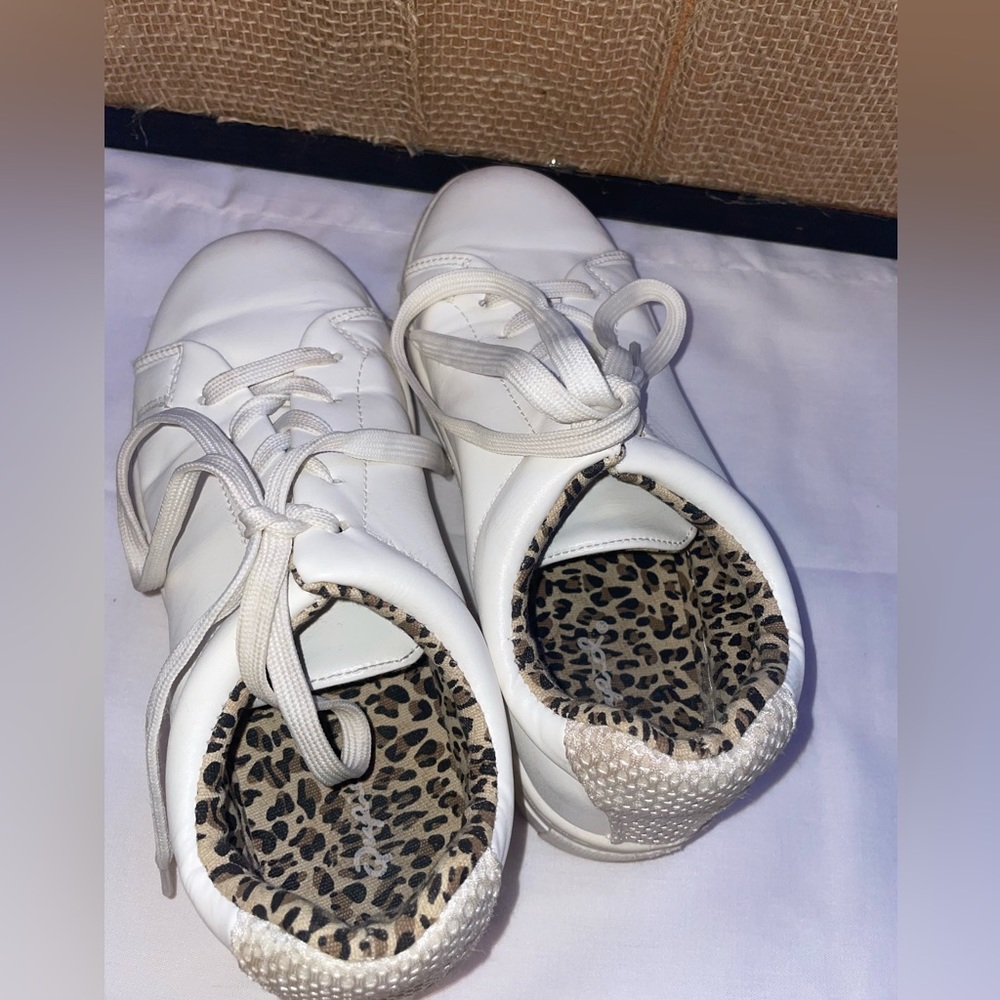 White sneakers with cheetah print interior. (a little dirty but can be cleaned)